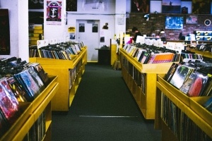 a picture of an organized vinyl record collection in a store